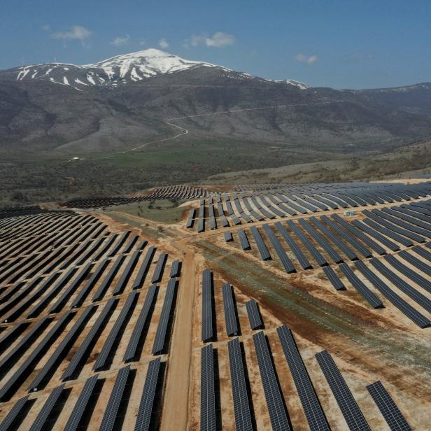 Solar panels used to produce renewable energy are pictured during the launch event of a photovoltaic park near Kozani