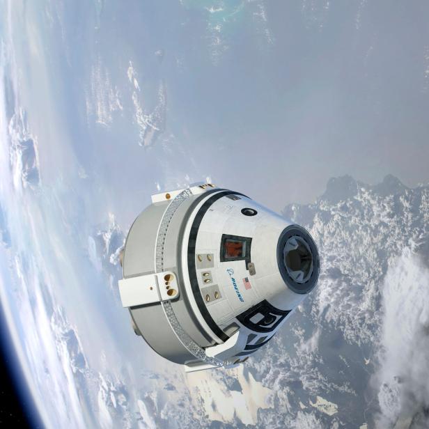 Die Boeing Starliner Raumkapsel über der Erde.