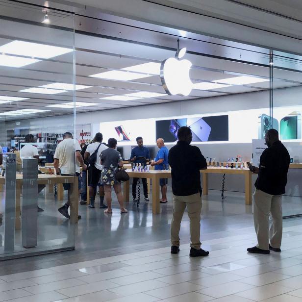 People visit the Apple store at the Cumberland Mall in Atlanta