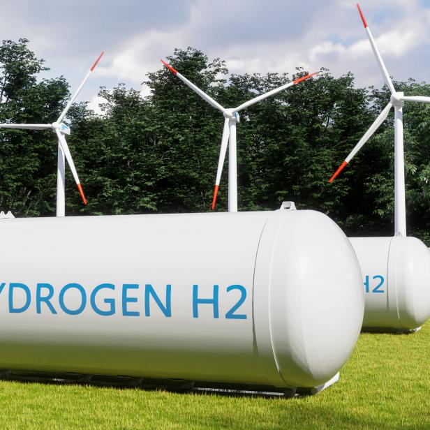Hydrogen Storage Tanks In Renewable Energy And Wind Turbines In The Forest.