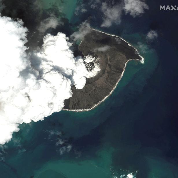 A satellite image shows the Hunga Tonga-Hunga Ha'apai volcano before its main eruption