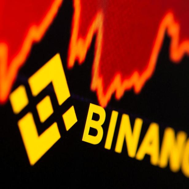 FILE PHOTO: Binance logo and stock graph are displayed in this illustration