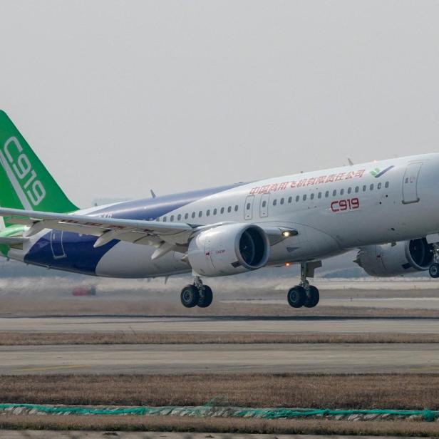 FILE PHOTO: The third prototype of China's home-built passenger jet C919 takes off during its first test flight at Shanghai Pudong International Airport