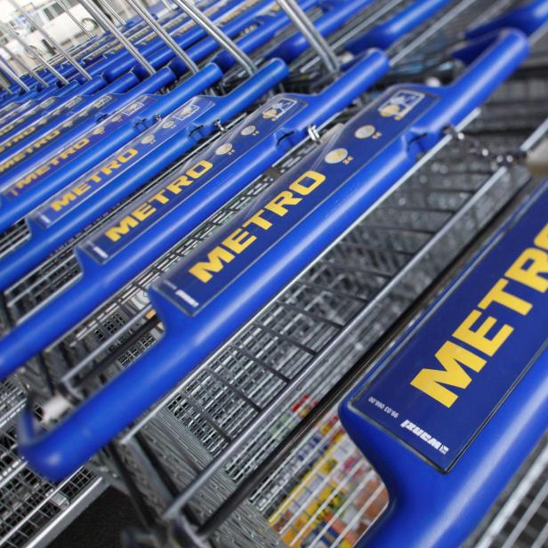 FILE PHOTO: Shopping carts of Germany's biggest retailer Metro AG are lined up at a Metro cash and carry market in St. Augustin