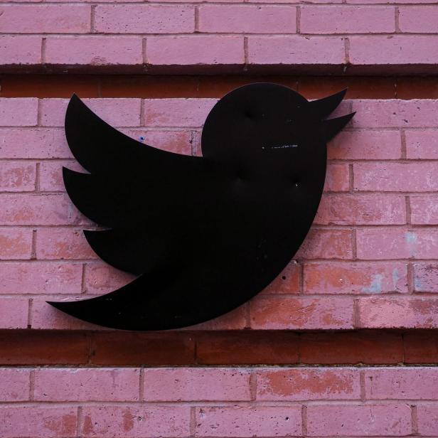 The Twitter logo is seen outside the offices in New York