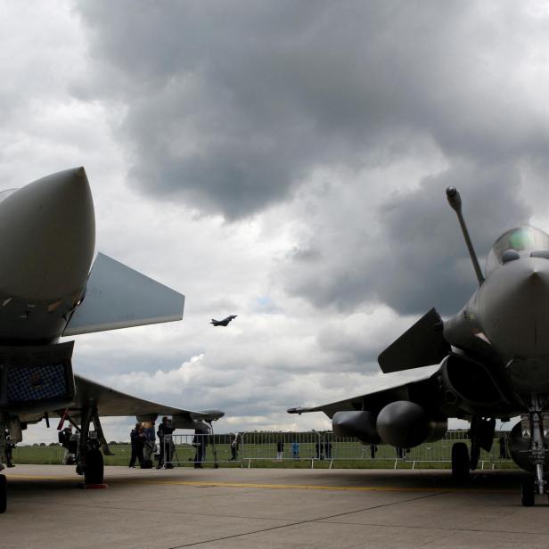 FILE PHOTO: Eurofighter Typhoon and a Dassault Rafale are seen at the ILA Air Show in Berlin, Germany