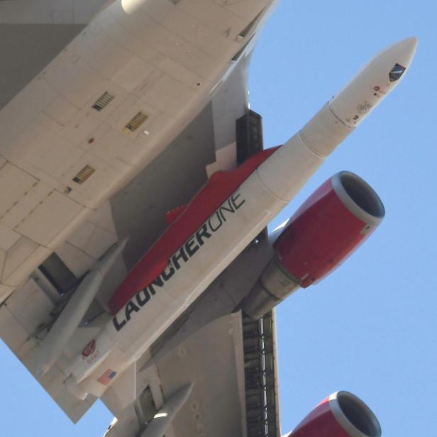 FILE PHOTO: A modified Boeing 747 takes flight carrying Virgin Orbit's LauncherOne rocket, in Mojave