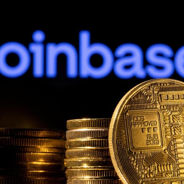 FILE PHOTO: Illustration shows a representation of cryptocurrency and Coinbase logo