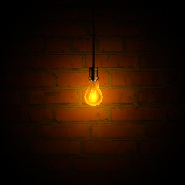 Light Bulb and Brick Wall