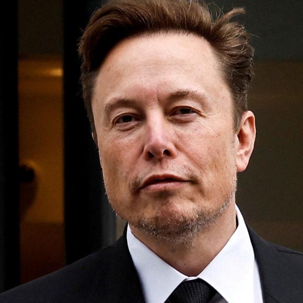 FILE PHOTO: Tesla CEO Musk departs the companys local office in Washington