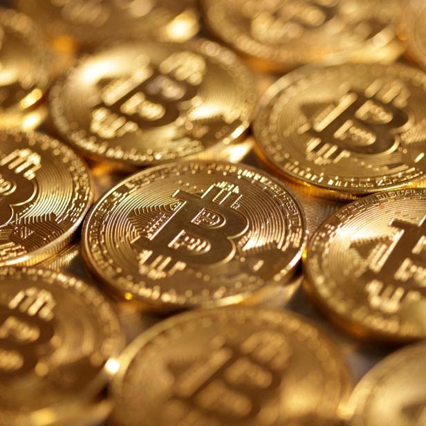 FILE PHOTO: FILE PHOTO: Illustration shows representations of cryptocurrency Bitcoin