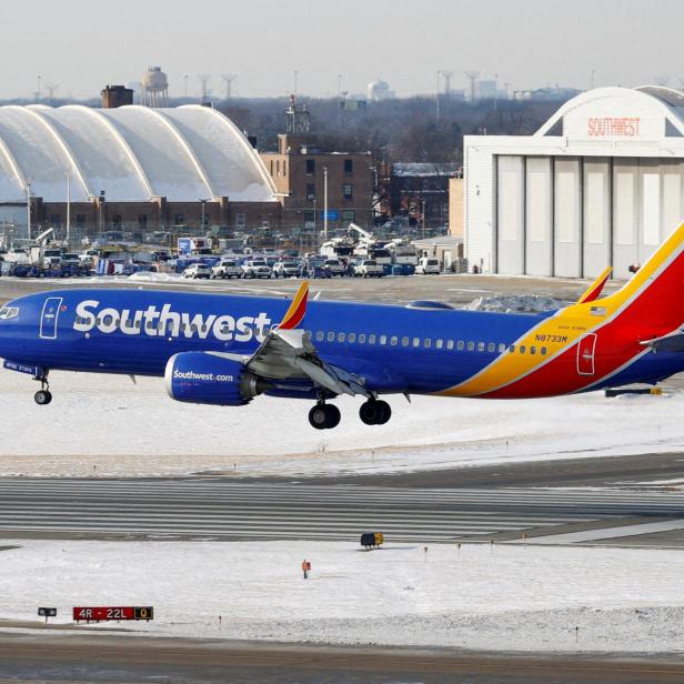 FILE PHOTO: Travelers deal with weather cancellations at Chicago Midway International Airport