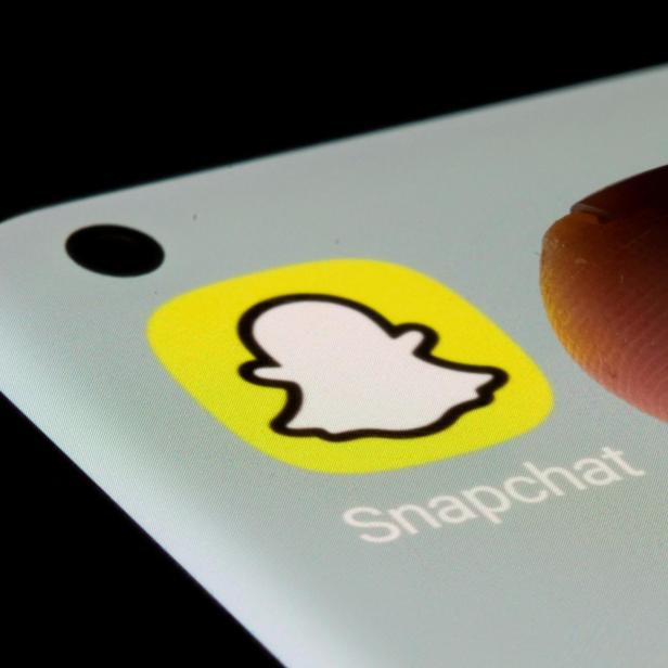 FILE PHOTO: Snapchat app is seen on a smartphone in this illustration