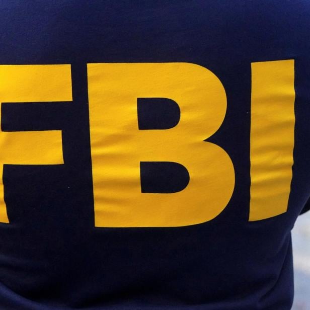 FILE PHOTO: An FBI logo is pictured on an agent's shirt in the Manhattan borough of New York City