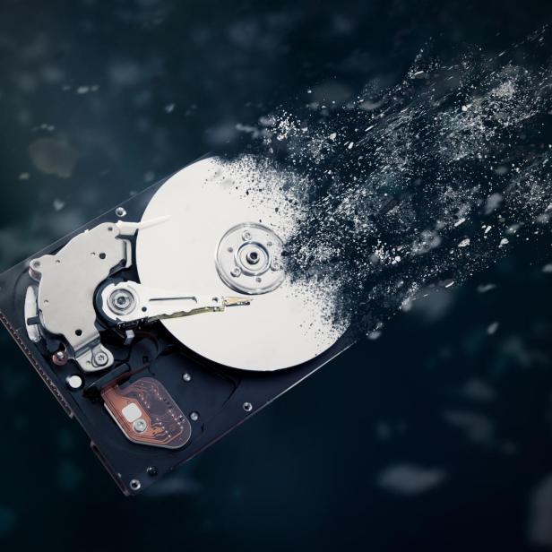 The old hard disk drive is disintegrating in space.