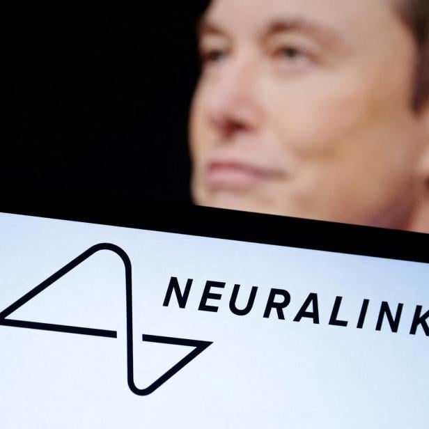 FILE PHOTO: FILE PHOTO: Illustration shows Neuralink logo and Elon Musk photo