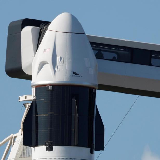 A SpaceX Falcon 9 with the Crew Dragon capsule stands on Pad-39A in preparation for the Inspiration 4 civilian crew mission at the Kennedy Space Center