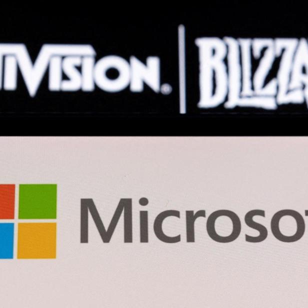 FILE PHOTO: Illustration of Microsoft and Activision Blizzard logos