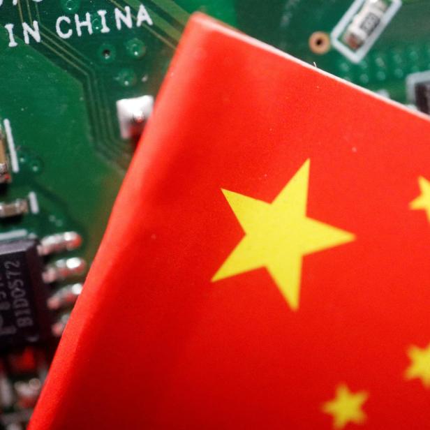 FILE PHOTO: Illustration picture of Chinese flag with semiconductor chips