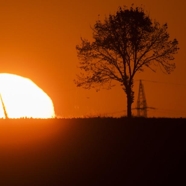 Landschaft mit Sonne