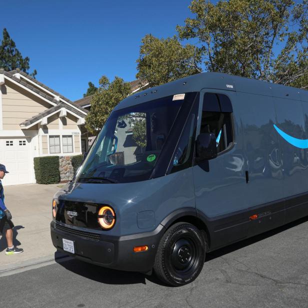 Electric Rivian trucks purchased by Amazon are pictured in Poway California