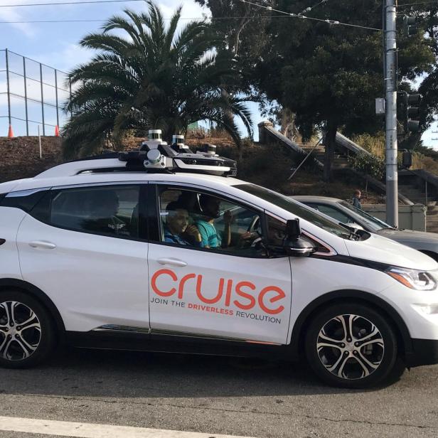 FILE PHOTO: A Cruise self-driving car, which is owned by General Motors Corp, is seen outside the companys headquarters in San Francisco