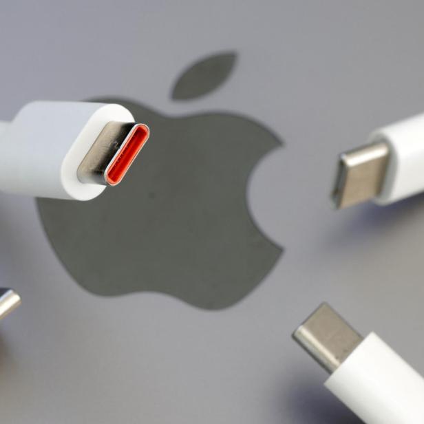 Illustration shows USB-C cables and Apple logo