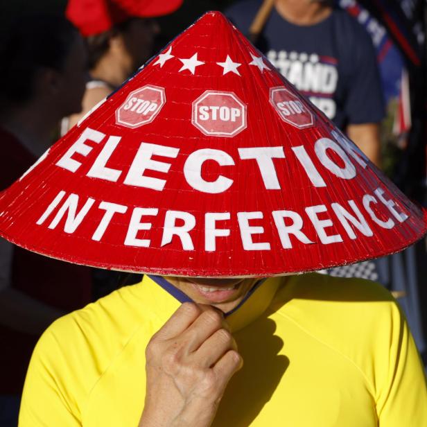 People rally during the second 2023 republican presidential debate in Simi Valley, California