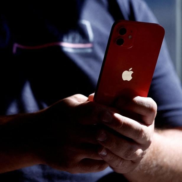 FILE PHOTO: An Apple iPhone 12 in a mobile phone store in Nantes