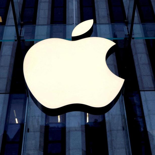 FILE PHOTO: The Apple logo is seen hanging at the entrance to the Apple store on 5th Avenue in Manhattan, New York, U.S., October 16, 2019. REUTERS/Mike Segar/