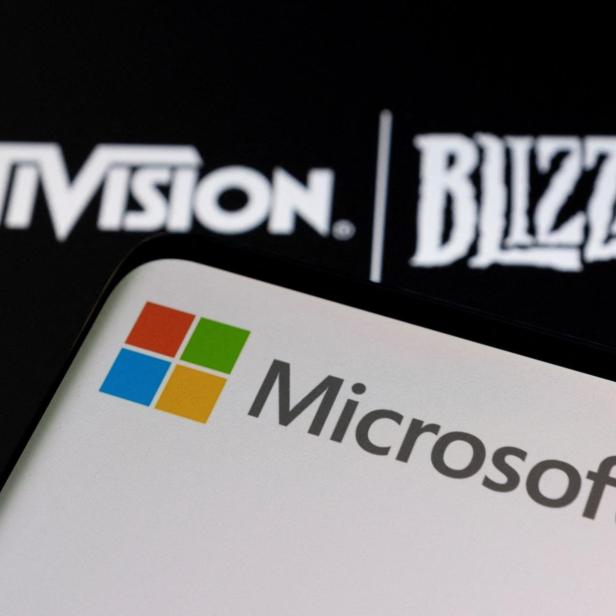 FILE PHOTO: Illustration of Microsoft and Activision Blizzard logos