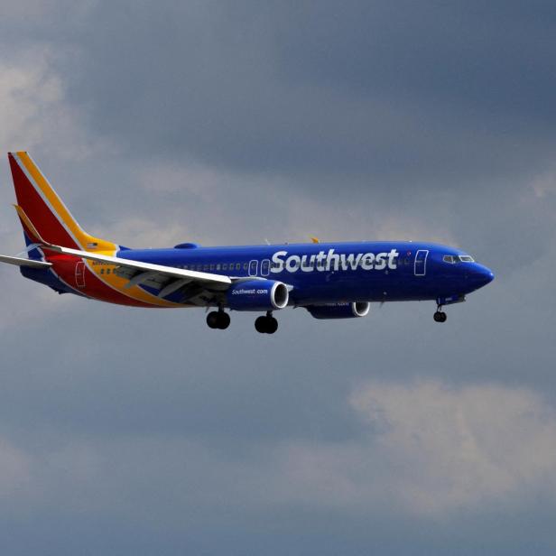 FILE PHOTO: A Southwest Airlines commercial aircraft approaches to land at John Wayne Airport in Santa Ana, California