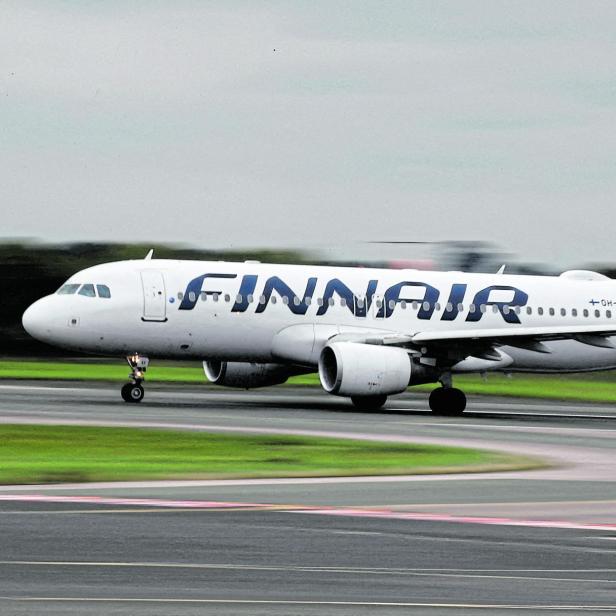 FILE PHOTO: FILE PHOTO: A Finnair Airbus A320 aircraft prepares to take off from Manchester Airport in Manchester