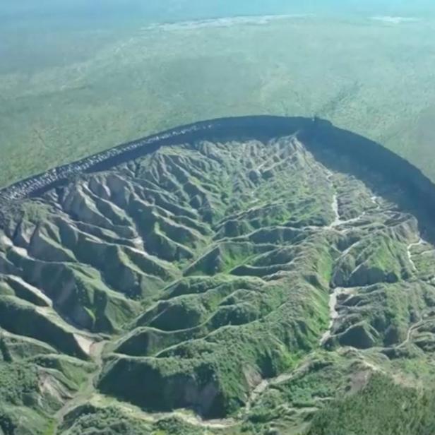 Drone footage of permafrost crater thawing in Russia's Far East as planet warms