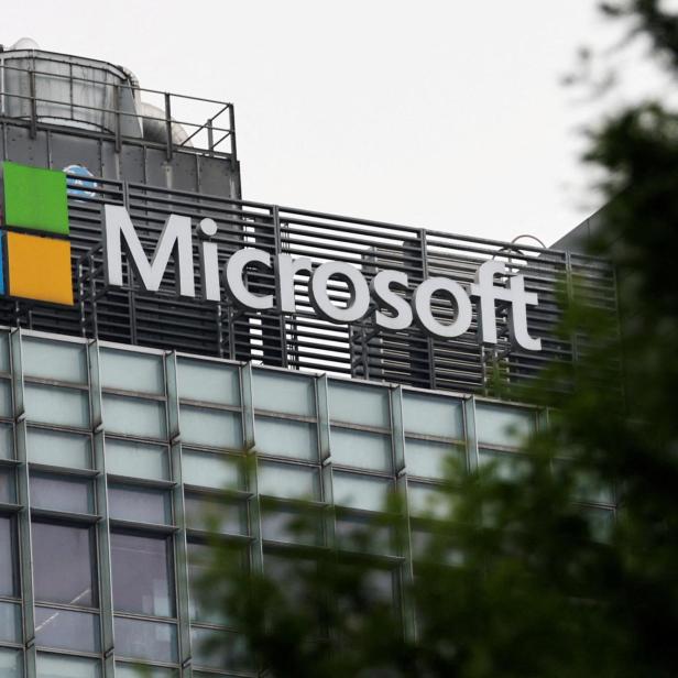 FILE PHOTO: Logo of Microsoft is pictured on its office building in Beijing