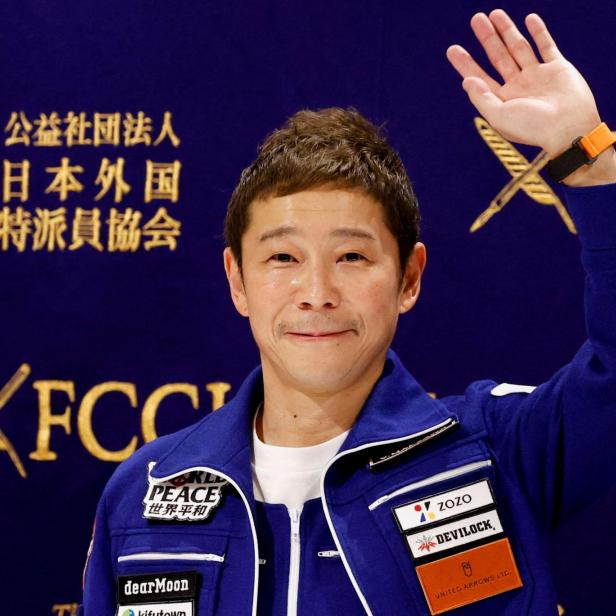 FILE PHOTO: Japanese billionaire Yusaku Maezawa attends a news conference after returning to Japan after a journey into space, in Tokyo