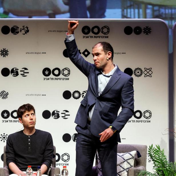 Sam Altman, CEO of OpenAI and ChatGPT creator listens to Ilya Sutskever co-founder and Chief Scientist of OpenAI in Tel Aviv