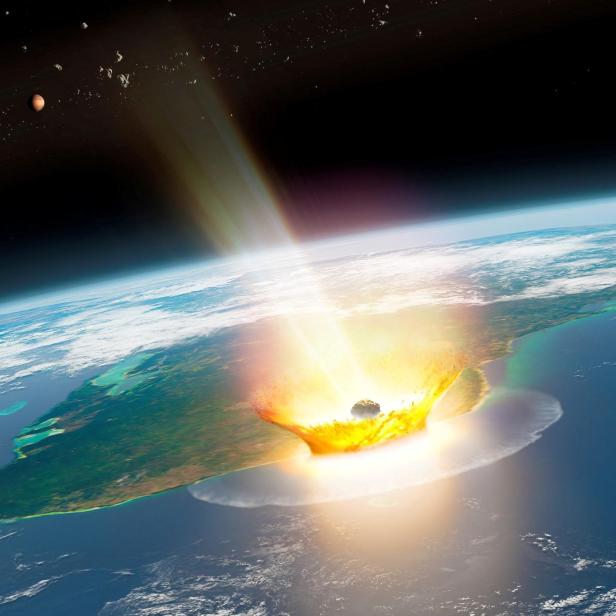 An artist's impression of a large asteroid impacting at Chicxulub