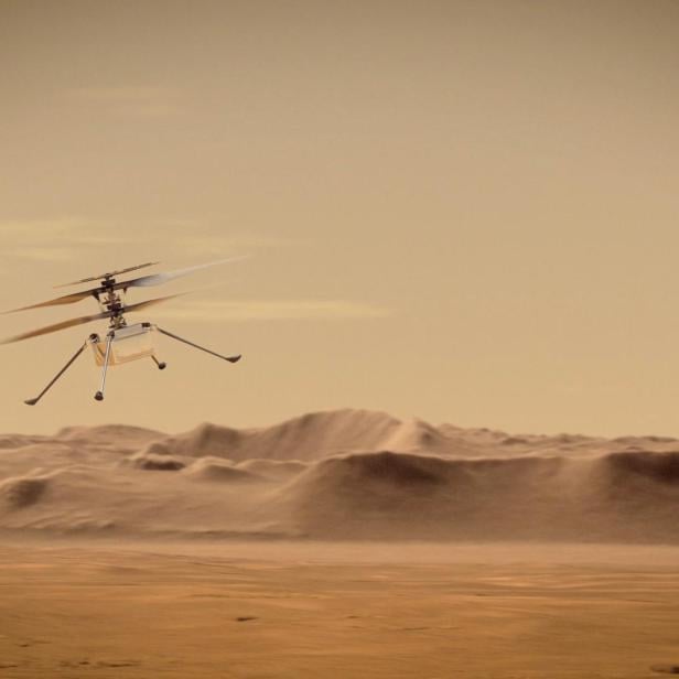 FILE PHOTO: Ingenuity Mars Helicopter flies over Mars