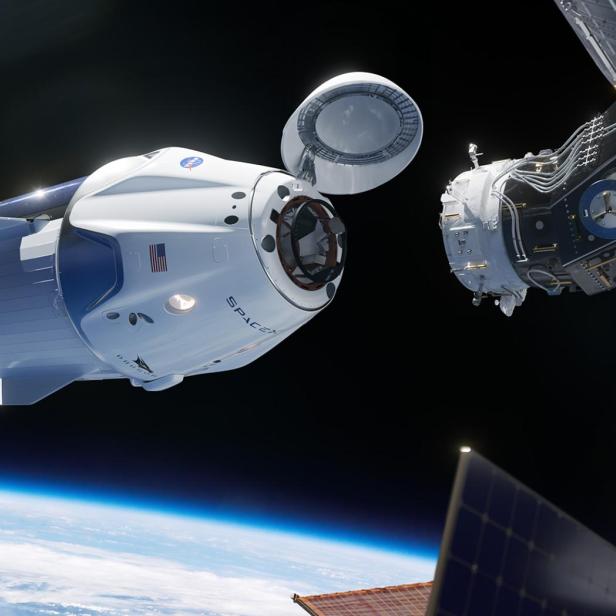 SpaceX Crew Dragon beim Docken an die ISS (künstlerische Darstellung)