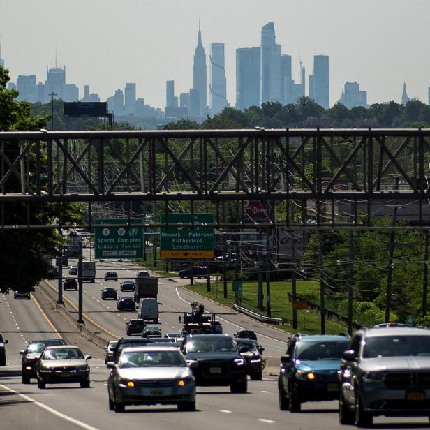 FILE PHOTO: Cars drive along a highway in New Jersey