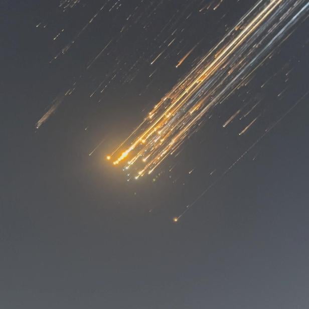 Orange balls of light fly across the sky as debris from a SpaceX rocket launched in Texas is spotted over Turks and Caicos Islands