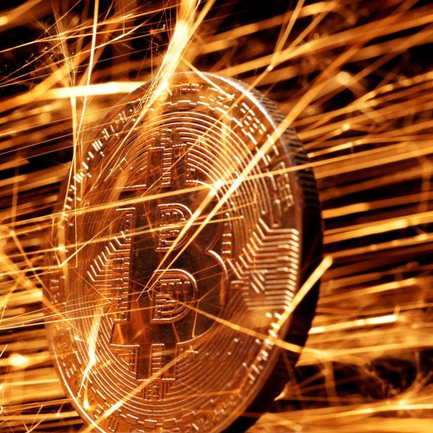 FILE PHOTO: FILE PHOTO: Illustration shows sparks strike representation of cryptocurrency Bitcoin