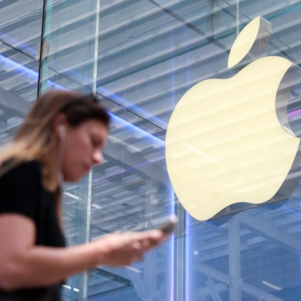 A person walks by the Apple store on Fifth Avenue in New York