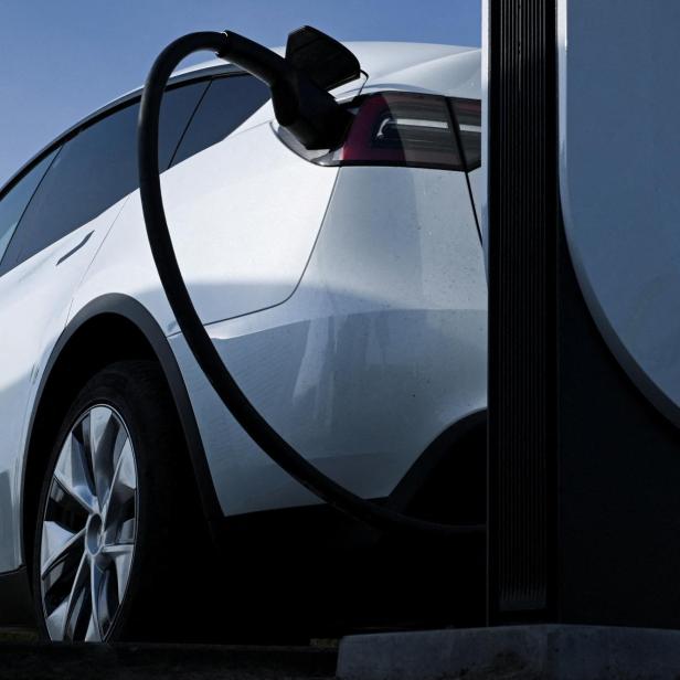 FILE PHOTO: A Tesla electric car charging station near Berlin