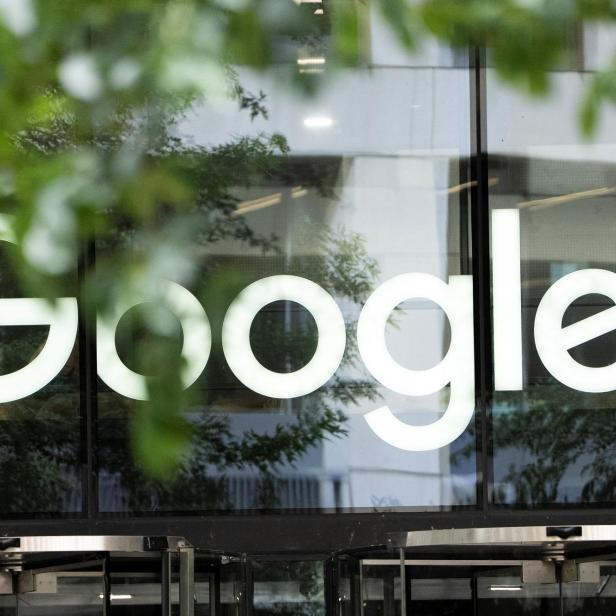 The Google logo is seen outside the company's office in London