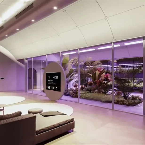 Ein luxuriöser Bunker von Nomad Bunkers mit Pflanzen und moderner Einrichtung.