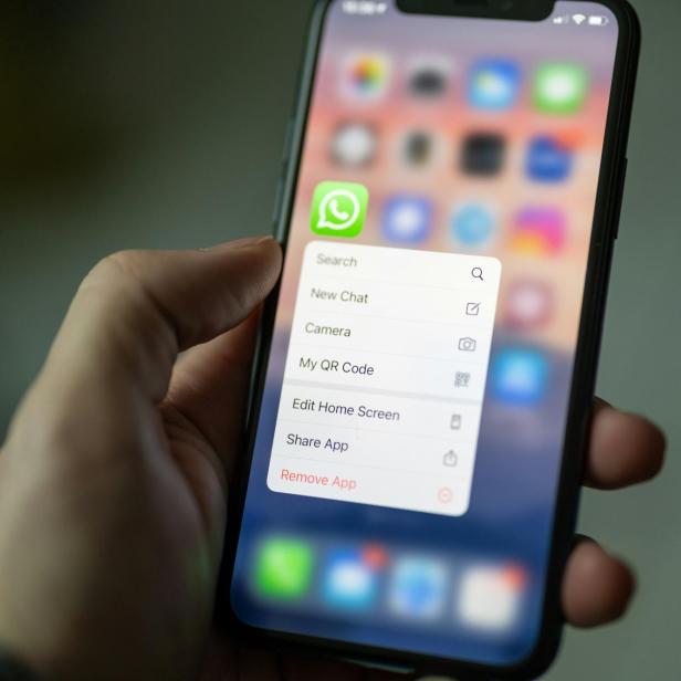 Ein WhatsApp Icon auf einem iPhone.