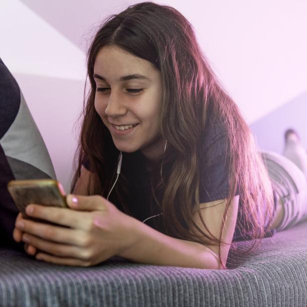 Teenage girl with mobile phone