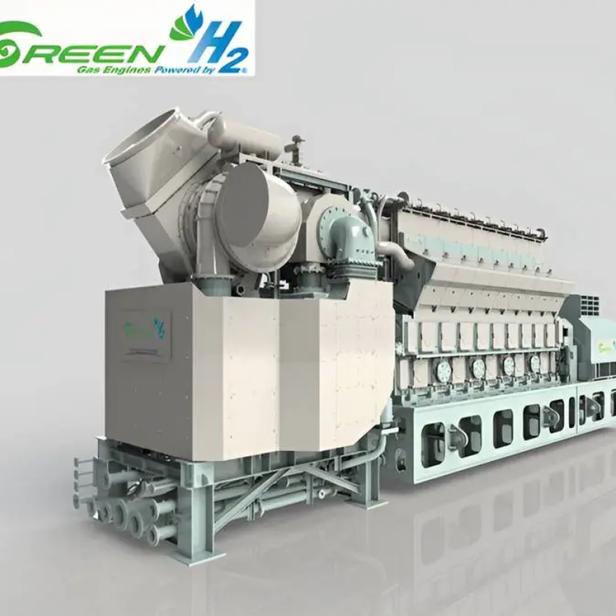 Große industrielle Gasturbine mit Wasserstofftechnologie in heller Umgebung.